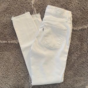 Levi’s 721 white ripped jeans